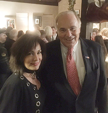 Judge McLaughlin and her chairman Gov. Ed Rendell celebrate the holidays at Mark Segal's party.